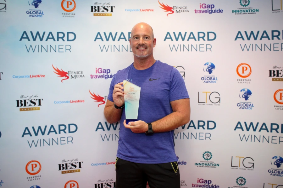 Paul Edmundson with the Fitness Education Provider of the Year Award, at Prestige Awards Ceremony