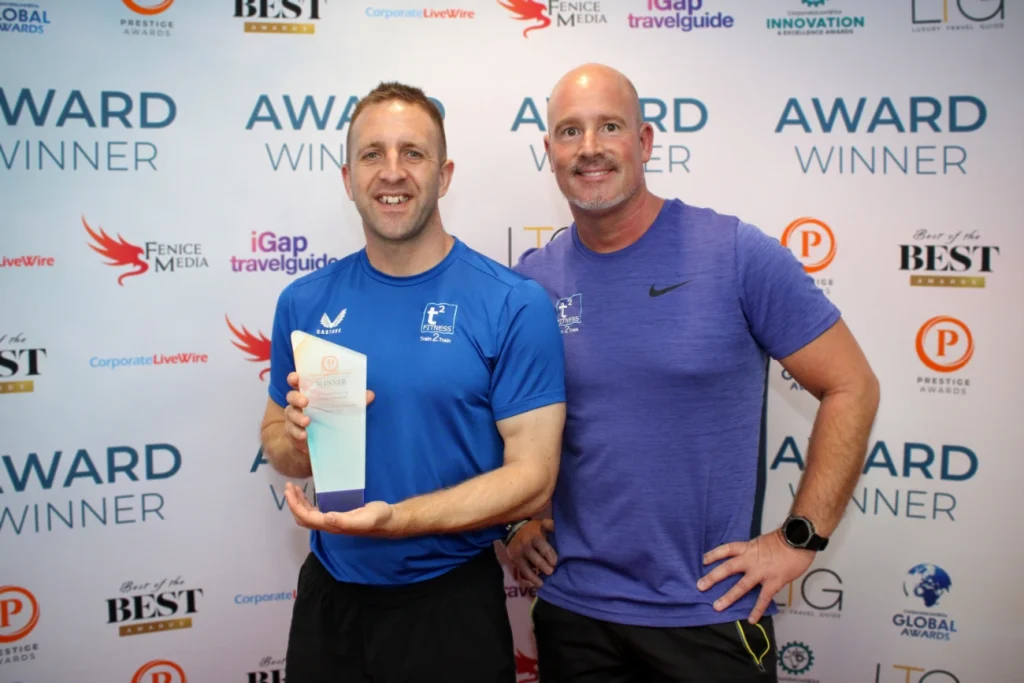 Stu Gatherum and Paul Edmundson collect the Prestige Award for Fitness Education Provider of the Year for South West 2025